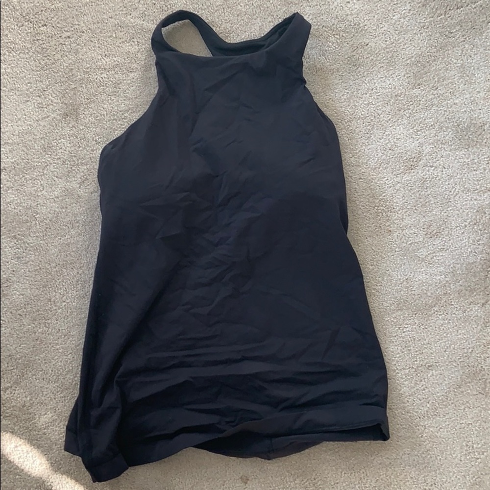 Cute black luluemon athletic top in good condition